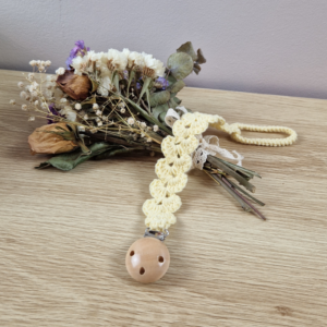 Attache-tétine au crochet jaune