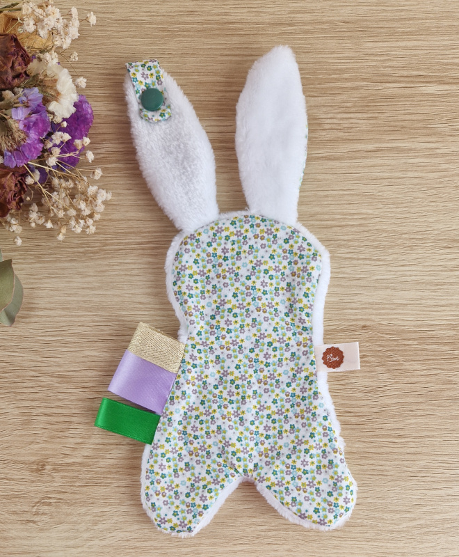Doudou plat attache-tétine fleuris vert